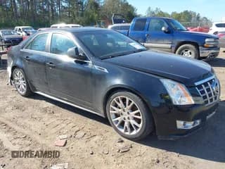 ✅ 2013 Cadillac CTS Premium • VIN: 1G6DP5E33D0163053 • Lot: 41399126. Listed on IAAI with 138,293 mi. Free auction sales archive from the USA and detailed vehicle history report at DreamBid. Image 1.