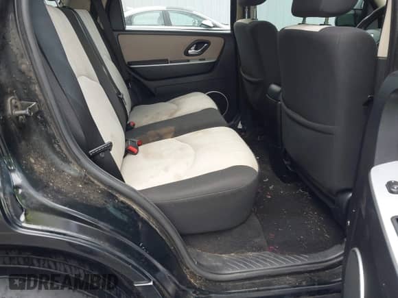 2006 Mercury Mariner Luxury with VIN 4M2YU56106KJ09196, listed as a IAAI auction lot 43307535 with 208,433 mi miles and . Bid and sale history available at DreamBid. Image 8.