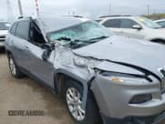 ✅ 2014 Jeep Cherokee Latitude • VIN: 1C4PJLCS0EW101599 • Lot: 43559434. Listed on IAAI with 129,767 mi. Free auction sales archive from the USA and detailed vehicle history report at DreamBid. Image 6.