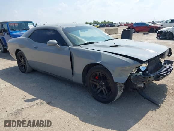 2012 Dodge Challenger SXT Plus z VIN 2C3CDYAG8CH176729, wystawiony jako IAAI lot #43219864 z przebiegiem 165 076 mil mil oraz . Historia ofert i sprzedaży dostępna na DreamBid. Obrazek 1.