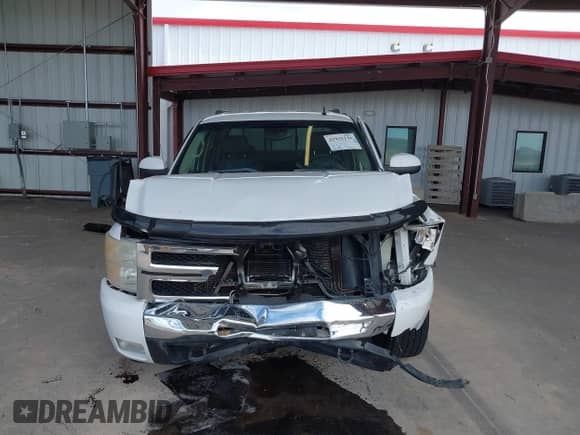 2007 Chevrolet Silverado 1500 LTZ с VIN 2GCFK13Y771667948, выставлен на аукционе IAAI как лот 42931236 с пробегом 193 536 миль миль и . История ставок и продаж доступна на DreamBid. Изображение 13.