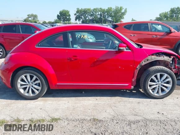 ✅ 2014 Volkswagen Beetle 2.0L TDI w/Sun/Sound/Nav • VIN: 3VWJL7AT6EM634671 • Лот: 42921278. Опубликован ранее на IAAI с пробегом 48 985 миль. Бесплатный доступ к архиву аукционных продаж из США и подробный отчёт об истории автомобиля на DreamBid. Изображение 14.