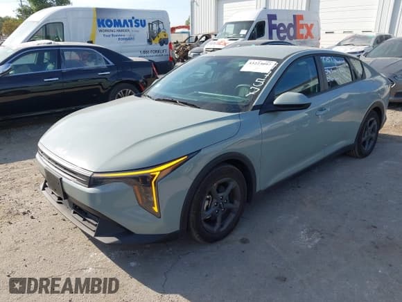 ✅ 2025 Kia K4 LXS • VIN: 3KPFT4DE0SE114962 • Lot: 43223097. Listed on IAAI with 6,118 mi. Free auction sales archive from the USA and detailed vehicle history report at DreamBid. Image 2.