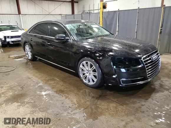 ✅ 2015 Audi A8 3.0L TDI • VIN: WAU3MAFD3FN002044 • Lot: 52869495. Listed on Copart with 129,094 mi. Free auction sales archive from the USA and detailed vehicle history report at DreamBid. Image 14.