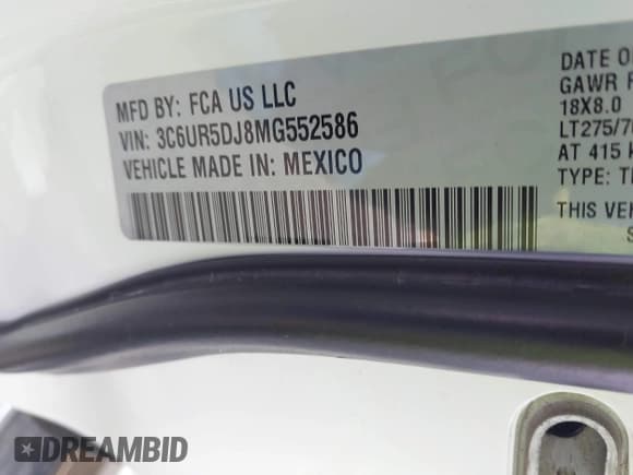 ✅ 2021 Ram 2500 Big Horn • VIN: 3C6UR5DJ8MG552586 • Лот: 41826654. Опубликован ранее на IAAI с пробегом 82 847 миль. Бесплатный доступ к архиву аукционных продаж из США и подробный отчёт об истории автомобиля на DreamBid. Изображение 9.