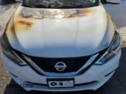 ✅ 2016 Nissan Sentra S • VIN: 3N1AB7AP9GY264789 • Lot: 92423135. Listed on Copart with 117,424 mi. Free auction sales archive from the USA and detailed vehicle history report at DreamBid. Image 11.