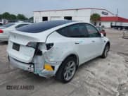 ✅ 2023 Tesla Model Y Long Range • VIN: 7SAYGDEE0PA065534 • Lot: 42445868. Listed on IAAI with 22,638 mi. Free auction sales archive from the USA and detailed vehicle history report at DreamBid. Image 4.