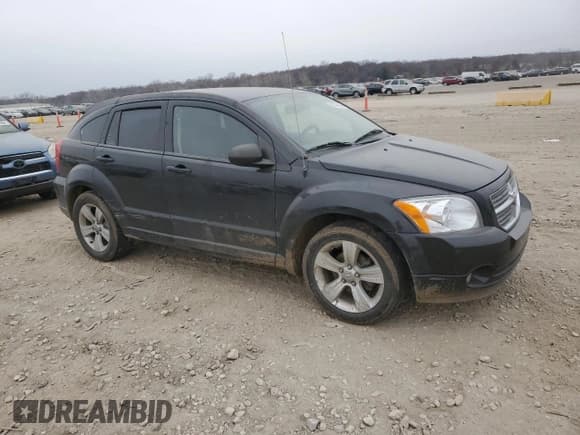 ✅ 2011 Dodge Caliber Mainstreet • VIN: 1B3CB3HA2BD107912 • Лот: 82769594. Опубликован ранее на Copart с пробегом 169 924 миль. Бесплатный доступ к архиву аукционных продаж из США и подробный отчёт об истории автомобиля на DreamBid. Изображение 4.