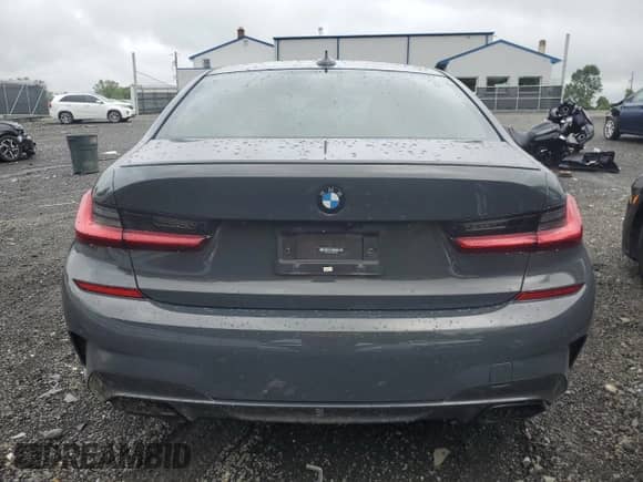 2021 BMW 3 Series M340i with VIN WBA5U7C0XMFL38231, listed as a Copart auction lot 65419024 with Not provided miles and Salvage title. Bid and sale history available at DreamBid. Image 6.