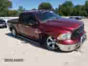 2018 Ram 1500 SLT with VIN 1C6RR7GT3JS348541, listed as a Copart auction lot 57144935 with 105,497 mi miles and Salvage title. Bid and sale history available at DreamBid. Image 4.