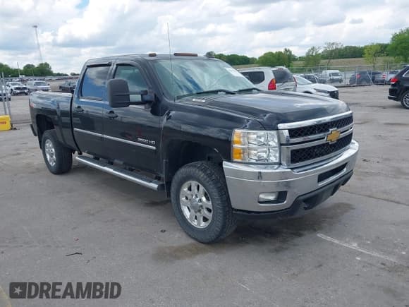 ✅ 2013 Chevrolet Silverado 2500HD LT • VIN: 1GC1KXCG6DF238504 • Lot: 42371679. Listed on IAAI with 206,794 mi. Free auction sales archive from the USA and detailed vehicle history report at DreamBid. Image 1.