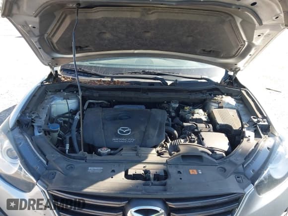 ✅ 2016 Mazda CX-5 Sport • VIN: JM3KE2BY9G0650696 • Lot: 43758478. Wystawiony na IAAI z przebiegiem 123 501 mil. Bezpłatny archiwum sprzedaży aukcyjnych z USA i szczegółowy raport historii pojazdu na DreamBid. Zdjęcie 10.