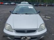 ✅ 2000 Honda Civic DX • VIN: 2HGEJ6344YH100325 • Лот: 42511882. Опубликован ранее на IAAI с пробегом 187 149 миль. Бесплатный доступ к архиву аукционных продаж из США и подробный отчёт об истории автомобиля на DreamBid. Изображение 12.