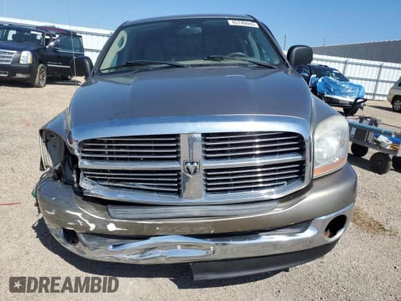 2006 Dodge 1500 Laramie z VIN 1D7HU182X6S677529, wystawiony jako Copart lot #65749695 z przebiegiem 193 955 mil mil oraz Szkoda całkowita • Salvage title. Historia ofert i sprzedaży dostępna na DreamBid. Obrazek 5.