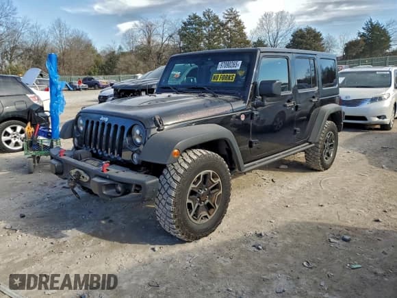 ✅ 2015 Jeep Wrangler Unlimited Rubicon Hard Rock • VIN: 1C4HJWFG6FL654919 • Lot: 97090265. Listed on Copart with 225,349 mi. Free auction sales archive from the USA and detailed vehicle history report at DreamBid. Image 1.