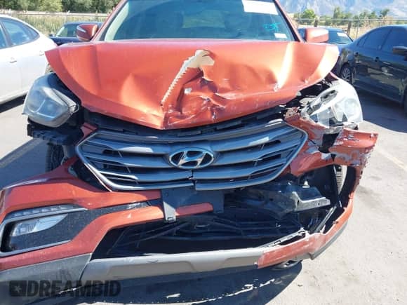 2018 Hyundai Santa Fe 2.4L z VIN 5XYZU3LB8JG523000, wystawiony jako IAAI lot #43263685 z przebiegiem 96 480 mil mil oraz . Historia ofert i sprzedaży dostępna na DreamBid. Obrazek 6.