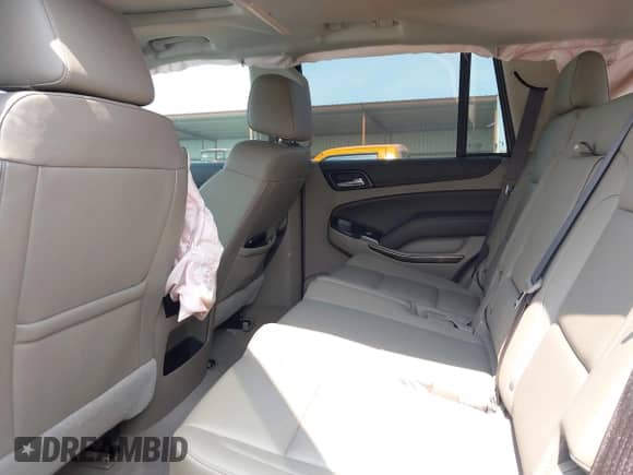 2019 Chevrolet Tahoe LT z VIN 1GNSKBKC5KR153517, wystawiony jako IAAI lot #42390642 z przebiegiem 52 034 mil mil oraz . Historia ofert i sprzedaży dostępna na DreamBid. Obrazek 8.