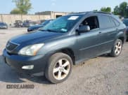 ✅ 2005 Lexus RX 330 • VIN: 2T2HA31U65C063843 • Lot: 43171157. Wystawiony na IAAI z przebiegiem 261 174 mil. Bezpłatny archiwum sprzedaży aukcyjnych z USA i szczegółowy raport historii pojazdu na DreamBid. Zdjęcie 2.