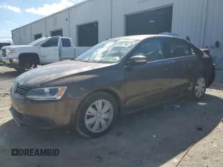 ✅ 2013 Volkswagen Jetta SE • VIN: 3VWDX7AJ9DM255050 • Lot: 86647795. Listed on Copart with 102,840 mi. Free auction sales archive from the USA and detailed vehicle history report at DreamBid. Image 1.