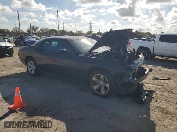 ✅ 2014 Dodge Challenger SXT • VIN: 2C3CDYAG6EH184864 • Лот: 85660624. Опубликован ранее на Copart с пробегом 105 204 миль. Бесплатный доступ к архиву аукционных продаж из США и подробный отчёт об истории автомобиля на DreamBid. Изображение 4.
