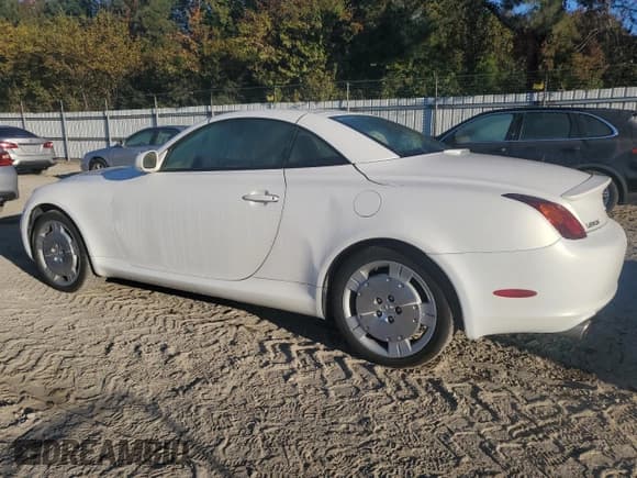 ✅ 2003 Lexus SC 430 • VIN: JTHFN48Y730038082 • Lot: 77005344. Listed on Copart with 133,491 mi. Free auction sales archive from the USA and detailed vehicle history report at DreamBid. Image 2.