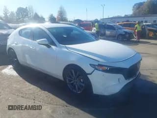 ✅ 2019 Mazda 3 • VIN: JM1BPAJM5K1141896 • Lot: 43667163. Listed on IAAI with 87,269 mi. Free auction sales archive from the USA and detailed vehicle history report at DreamBid. Image 1.