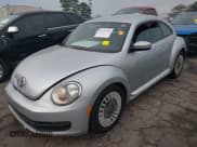 ✅ 2013 Volkswagen Beetle 2.5L • VIN: 3VWJP7ATXDM666347 • Lot: 41721351. Wystawiony na IAAI z przebiegiem 169 845 mil. Bezpłatny archiwum sprzedaży aukcyjnych z USA i szczegółowy raport historii pojazdu na DreamBid. Zdjęcie 17.