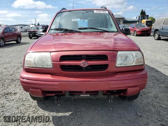 ✅ 1999 Suzuki Vitara JX • VIN: 2S3TD52V9X6101435 • Лот: 57801905. Опубликован ранее на Copart с пробегом 82 346 миль. Бесплатный доступ к архиву аукционных продаж из США и подробный отчёт об истории автомобиля на DreamBid. Изображение 5.