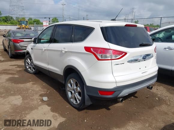 ✅ 2013 Ford Escape SEL • VIN: 1FMCU9HX6DUB14053 • Lot: 42361297. Wystawiony na IAAI z przebiegiem 144 861 mil. Bezpłatny archiwum sprzedaży aukcyjnych z USA i szczegółowy raport historii pojazdu na DreamBid. Zdjęcie 3.