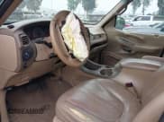 ✅ 1998 Ford Expedition XLT • VIN: 1FMPU18L7WLB22719 • Lot: 42777556. Wystawiony na IAAI z przebiegiem 274 700 mil. Bezpłatny archiwum sprzedaży aukcyjnych z USA i szczegółowy raport historii pojazdu na DreamBid. Zdjęcie 5.