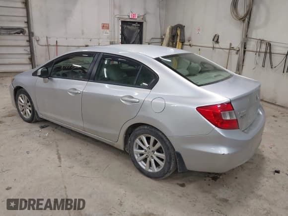✅ 2012 Honda Civic EX-L • VIN: 2HGFB2F98CH528490 • Lot: 43688652. Listed on IAAI with 318,078 mi. Free auction sales archive from the USA and detailed vehicle history report at DreamBid. Image 3.