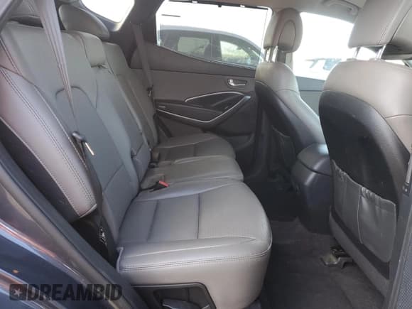 ✅ 2015 Hyundai Santa Fe • VIN: 5XYZU3LBXFG264162 • Lot: 89681285. Listed on Copart with 96,828 mi. Free auction sales archive from the USA and detailed vehicle history report at DreamBid. Image 10.