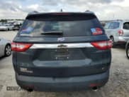 ✅ 2021 Chevrolet Traverse LT Cloth • VIN: 1GNERGKW1MJ165522 • Lot: 74802984. Wystawiony na Copart z przebiegiem 80 523 mil. Bezpłatny archiwum sprzedaży aukcyjnych z USA i szczegółowy raport historii pojazdu na DreamBid. Zdjęcie 6.