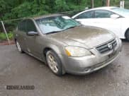 ✅ 2002 Nissan Altima SL • VIN: 1N4AL11DX2C208557 • Lot: 42522797. Listed on IAAI with 111,700 mi. Free auction sales archive from the USA and detailed vehicle history report at DreamBid. Image 1.