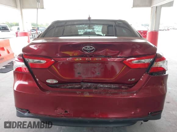 2019 Toyota Camry LE with VIN 4T1B11HK9KU681980, listed as a IAAI auction lot 43083575 with 117,268 mi miles and . Bid and sale history available at DreamBid. Image 16.