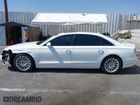 ✅ 2015 Audi A8 4.0T • VIN: WAU32AFD0FN007028 • Lot: 42719029. Wystawiony na IAAI z przebiegiem 75 203 mil. Bezpłatny archiwum sprzedaży aukcyjnych z USA i szczegółowy raport historii pojazdu na DreamBid. Zdjęcie 15.