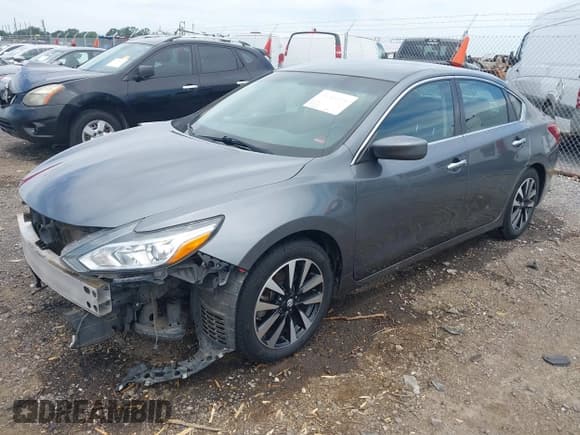 ✅ 2018 Nissan Altima S • VIN: 1N4AL3AP4JC200104 • Lot: 42608978. Wystawiony na IAAI z przebiegiem 171 986 mil. Bezpłatny archiwum sprzedaży aukcyjnych z USA i szczegółowy raport historii pojazdu na DreamBid. Zdjęcie 19.
