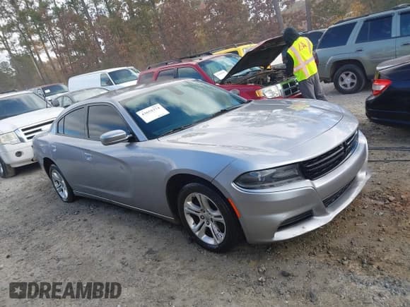 ✅ 2015 Dodge Charger SE • VIN: 2C3CDXBG4FH747971 • Lot: 43658374. Listed on IAAI with 220,885 mi. Free auction sales archive from the USA and detailed vehicle history report at DreamBid. Image 13.