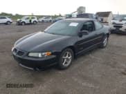 ✅ 2002 Pontiac Grand Prix GTP • VIN: 1G2WR121X2F174562 • Lot: 43260669. Listed on IAAI with 113,510 mi. Free auction sales archive from the USA and detailed vehicle history report at DreamBid. Image 2.