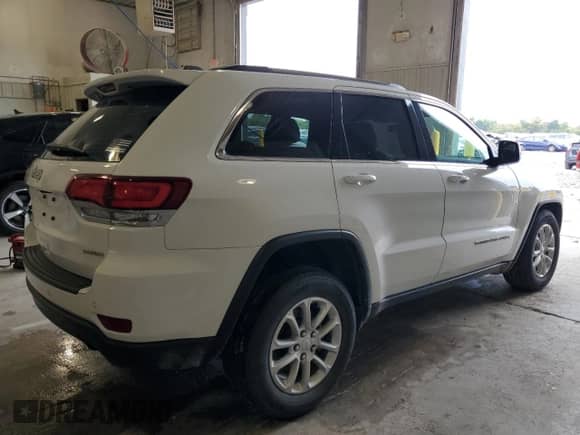 2021 Jeep Grand Cherokee Laredo X z VIN 1C4RJFAG9MC797517, wystawiony jako Copart lot #86253195 z przebiegiem 44 444 mil mil oraz Szkoda całkowita • Salvage title. Historia ofert i sprzedaży dostępna na DreamBid. Obrazek 3.