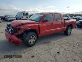 2005 Dodge Dakota SLT z VIN 1D7HW48K05S310312, wystawiony jako Copart lot #88061125 z przebiegiem 208 806 mil mil oraz Nie do naprawy • Non repairable. Historia ofert i sprzedaży dostępna na DreamBid. Obrazek 1.