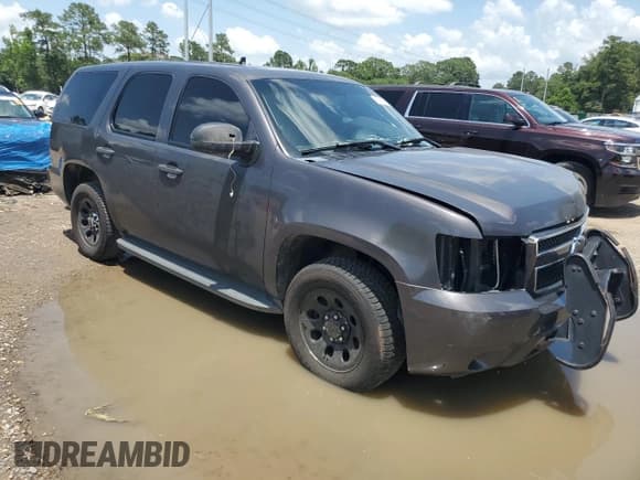 ✅ 2011 Chevrolet Tahoe Commercial • VIN: 1GNLC2E0XBR136988 • Lot: 60869755. Listed on Copart with 190,507 mi. Free auction sales archive from the USA and detailed vehicle history report at DreamBid. Image 4.