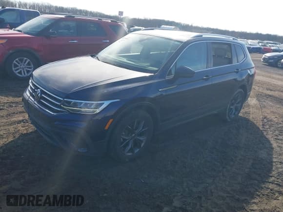 ✅ 2023 Volkswagen Tiguan SE • VIN: 3VVNB7AX3PM040666 • Lot: 41771816. Listed on IAAI with 28,832 mi. Free auction sales archive from the USA and detailed vehicle history report at DreamBid. Image 2.