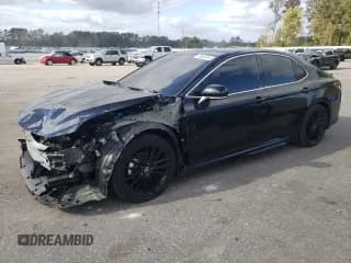 ✅ 2023 Toyota Camry XSE • VIN: 4T1KZ1AKXPU084377 • Lot: 79532244. Listed on Copart with 33,010 mi. Free auction sales archive from the USA and detailed vehicle history report at DreamBid. Image 1.