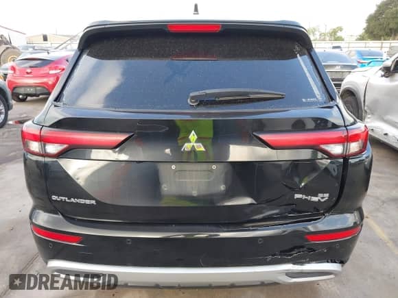 2023 Mitsubishi Outlander SE with VIN JA4T5UA97PZ058755, listed as a IAAI auction lot 42543170 with 66,418 mi miles and . Bid and sale history available at DreamBid. Image 16.