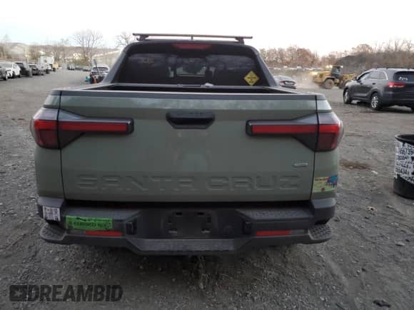 2022 Hyundai Santa Cruz SEL z VIN 5NTJCDAE2NH008867, wystawiony jako Copart lot #79884604 z przebiegiem 52 868 mil mil oraz Szkoda całkowita • Salvage title. Historia ofert i sprzedaży dostępna na DreamBid. Obrazek 6.