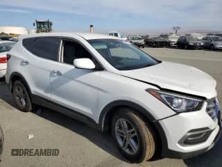 ✅ 2018 Hyundai Santa Fe 2.4L • VIN: 5NMZTDLB4JH083792 • Лот: 62271733. Опубликован ранее на Copart с пробегом Не указан. Бесплатный доступ к архиву аукционных продаж из США и подробный отчёт об истории автомобиля на DreamBid. Изображение 4.