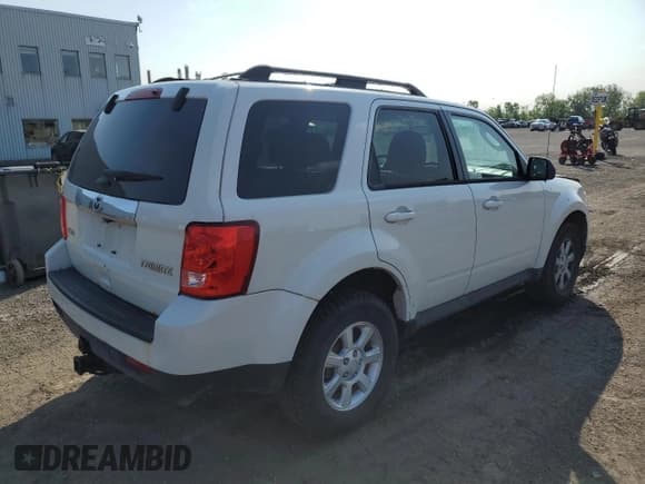 ✅ 2011 Mazda Tribute Grand Touring • VIN: 4F2CY9GG2BKM03577 • Lot: 57143185. Listed on Copart with 173,537 mi. Free auction sales archive from the USA and detailed vehicle history report at DreamBid. Image 3.