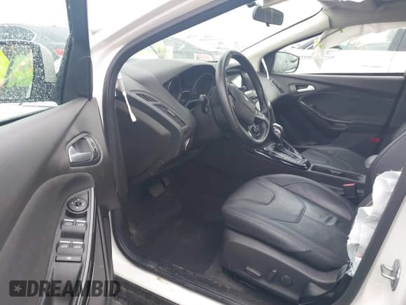 ✅ 2016 Ford Focus Titanium • VIN: 1FADP3N26GL387872 • Lot: 42183397. Listed on IAAI with 30,557 mi. Free auction sales archive from the USA and detailed vehicle history report at DreamBid. Image 5.