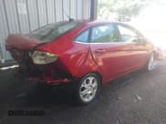 ✅ 2015 Ford Fiesta Titanium • VIN: 3FADP4CJ5FM205883 • Lot: 42584615. Wystawiony na IAAI z przebiegiem 167 339 mil. Bezpłatny archiwum sprzedaży aukcyjnych z USA i szczegółowy raport historii pojazdu na DreamBid. Zdjęcie 4.